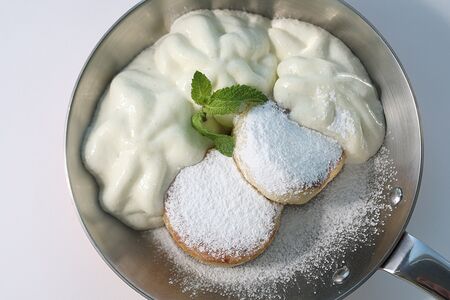 Сырники со сметаной