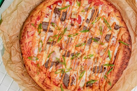 Пицца Мясное ассорти с подкопченным соусом ранч