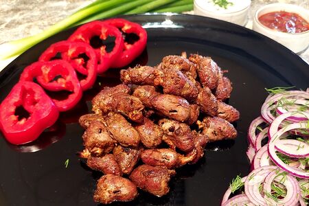 Куриные сердечки на углях