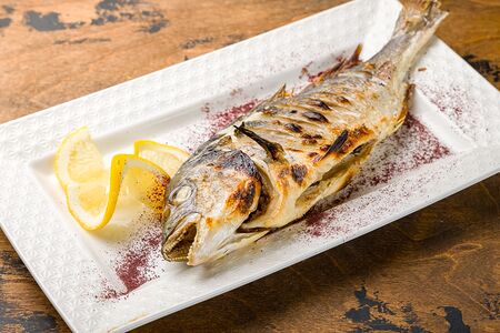 Дорада запечённая