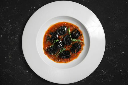 Черные пельмени с нельмой