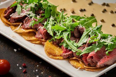 Тальята с рукколой и пармезаном