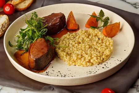 Утиное магре с птитимом и мандариновым демигласом