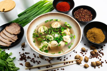 Пельмени с бульоном