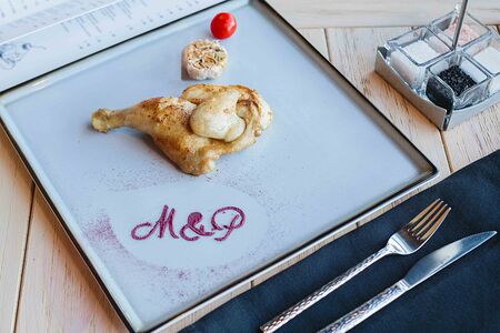 Половина цыпленка на гриле