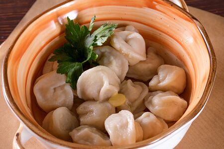 Пельмени из оленины со сметаной