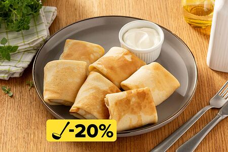 Большая порция блинчиков с мясом