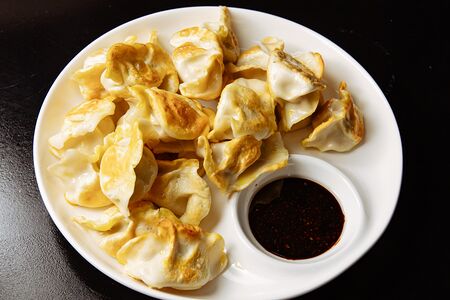 Жареные пельмени со свининой