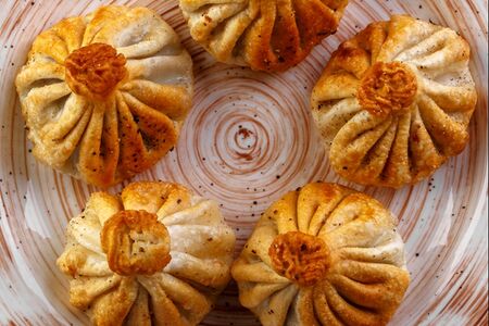 Хинкали с грибами жареные