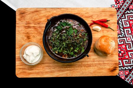 Чорба с фасолью на копченых свиных ребрах