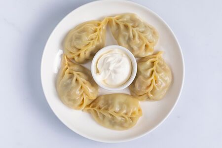 Манты с мясом и тыквой