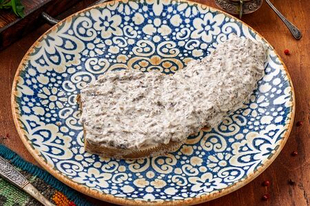 Язык коровий в грибном соусе