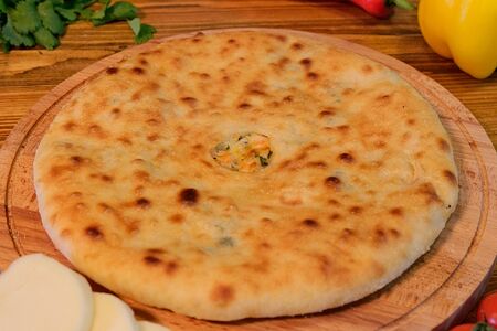 Осетинский пирог с картофелем и зеленью