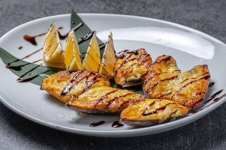 Мидии под соусом Тапанадо