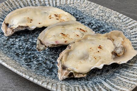 Устрицы, запеченные в сливочном соусе