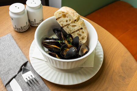 Мидии в сливочном соусе