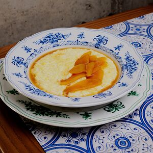 Пшенная каша с томленой грушей и пармезаном