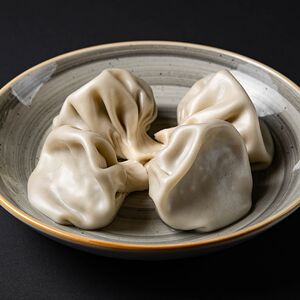 Отварные хинкали с говядиной и свининой