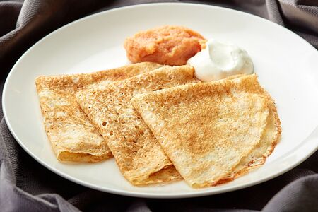 Блины с икрой минтая и сметаной