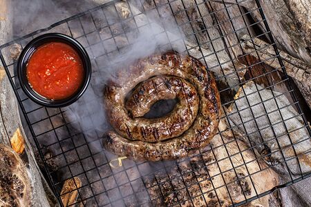 Жареная баранья колбаска с гарниром