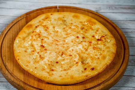 Осетинский пирог с мясом и зеленью