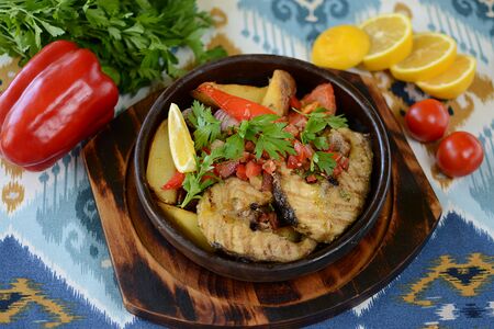 Жареная осетрина с овощами