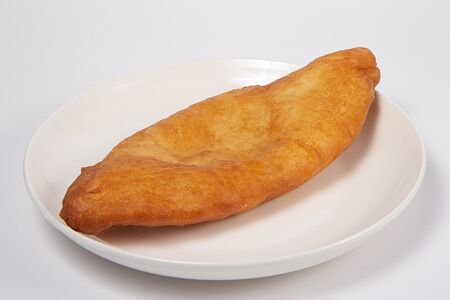 Пирожок с картошкой жареный