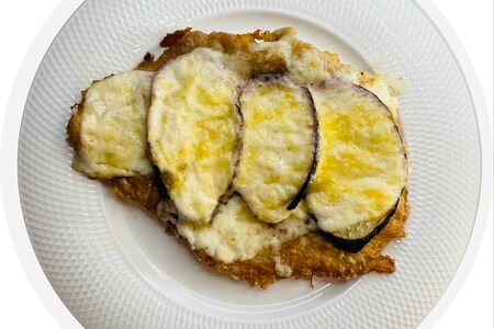 Отбивная свиная с овощами под сыром