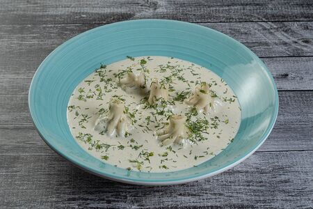 Мини хинкали в сливочном соусе