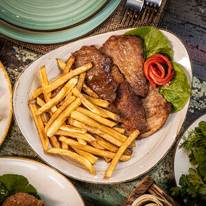 Խոզի միսը սպիտակ գինով և սխտորով