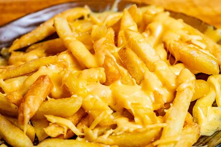 Картофель фри с сыром