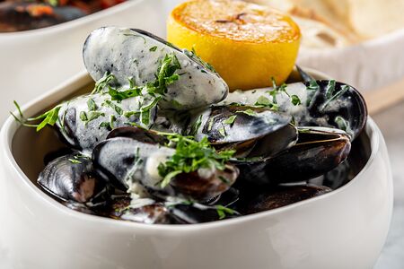 Мидии в сливочном соусе