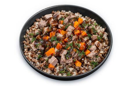 Гречневая каша с говядиной в овощном соусе