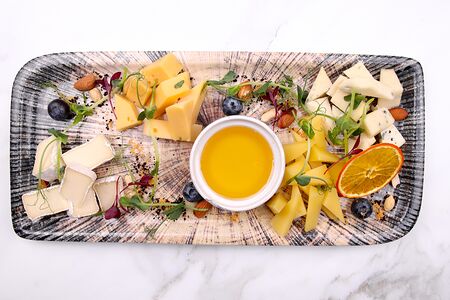Ассорти благородных сыров