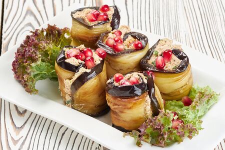 Рулеты из баклажанов с грецким орехом