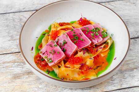 Папарделле с тунцом и соусом арабьята