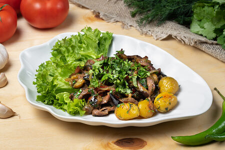 Телятина с овощами