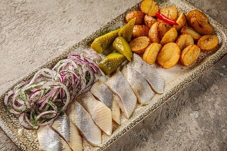 Сельдь с картофелем