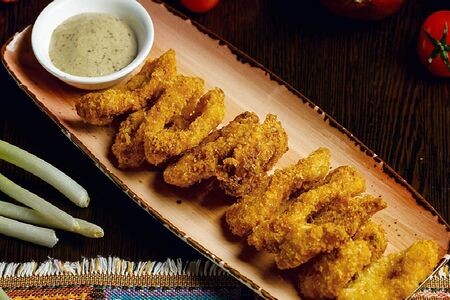 Кольца кальмара в сухарях