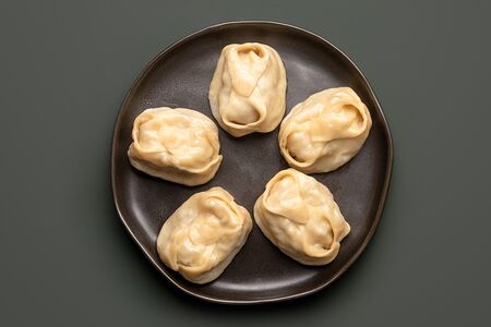 Манты с говядиной и тыквой