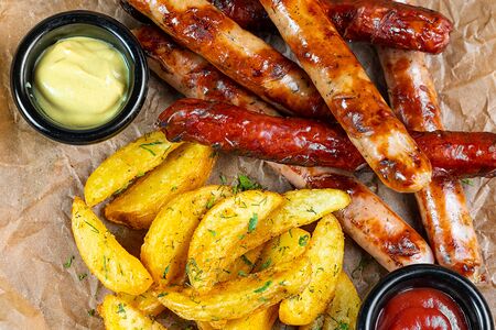 Колбаски на гриле