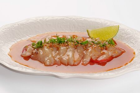 Севиче из дорадо с томатами