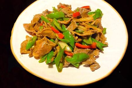 Жареная говядина с овощами