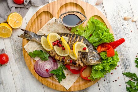 Дорадо на углях с наршарабом