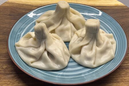 Хинкали из свинины и говядины вареные