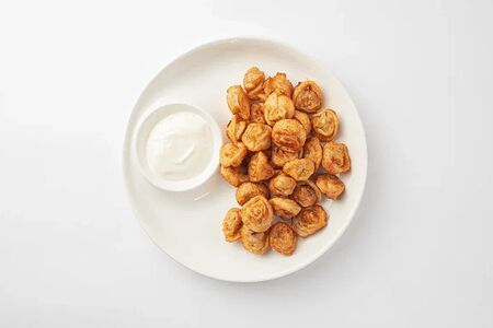 Пельмени жареные