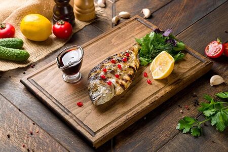 Дорадо на мангале