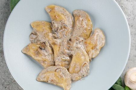Вареники с картофелем и грибами в сливочном соусе
