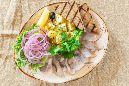 Сельдь с гарниром