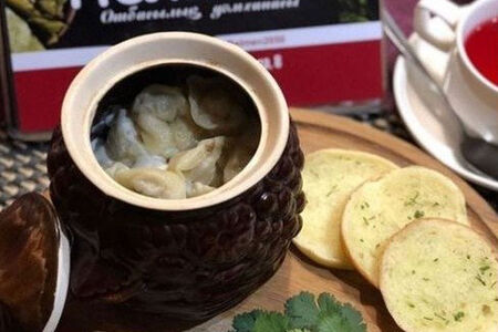 Пельмени в сливочном соусе